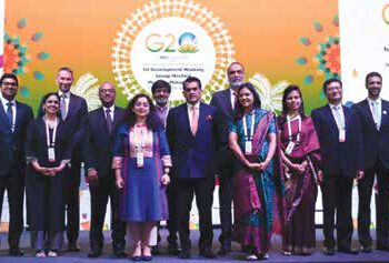G20 delegates posing for a group photo at the side event