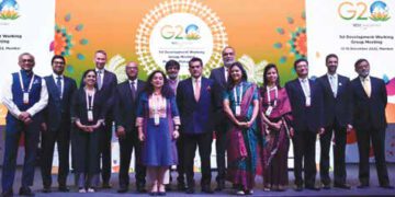 G20 delegates posing for a group photo at the side event