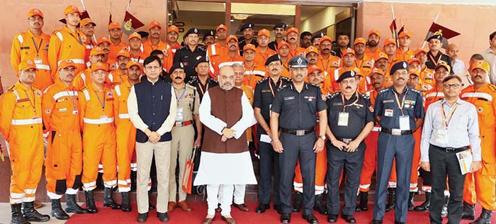 Home Minister Amit Shah at a conference organised by the NDRF – File photo