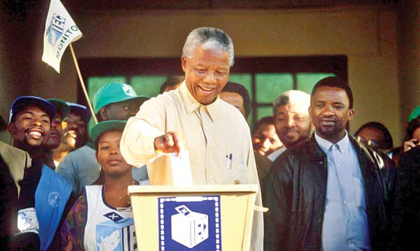 Nelson Mandela casts his vote during South Africa’s historic general election in 1994