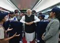 Interacting with young friends aboard a Vande Bharat train
