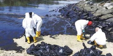 Oil spill off Singapore spreads