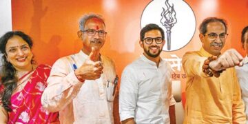 Uddhav Thackeray with his son after the election results