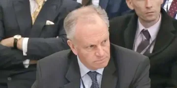 Post Office chief to quit