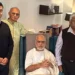 Spiritual leader Rameshbhai Oza, popularly known as Pujya Bhaishri, with members of the Maa Kupa Foundation, UK