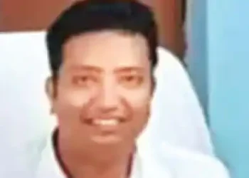 Father washes officers' clothes, but son is not seen