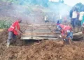 Landslides kill dozens, bury homes