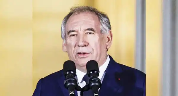 Macron names centrist Bayrou as PM