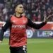 Leverkusen overpowers Bochum to stay in Bundesliga title race