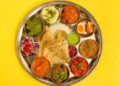 Home-cooked veg, non-veg thalis get cheaper in May as food inflation cools