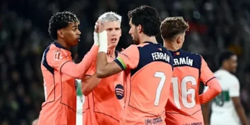 Barcelona down Elche to retain lead in La Liga