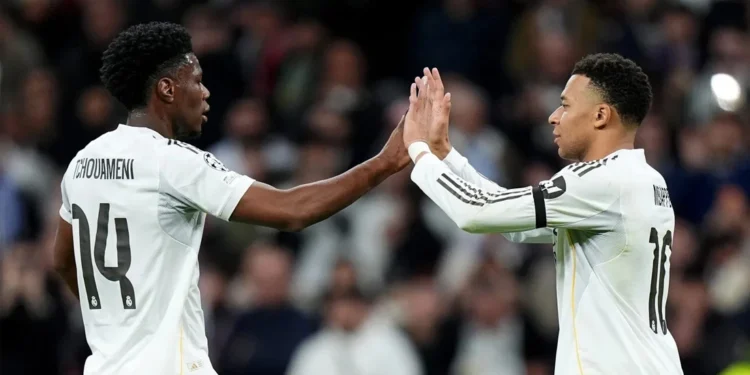 PSG overcome Monaco to advance in Champions League