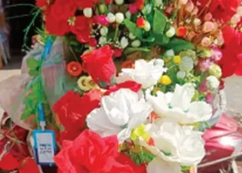 The artificial flower business has reached temples.