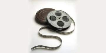 Reels of motion picture film in metal cans