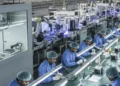 A worker on an electronics assembly line in India